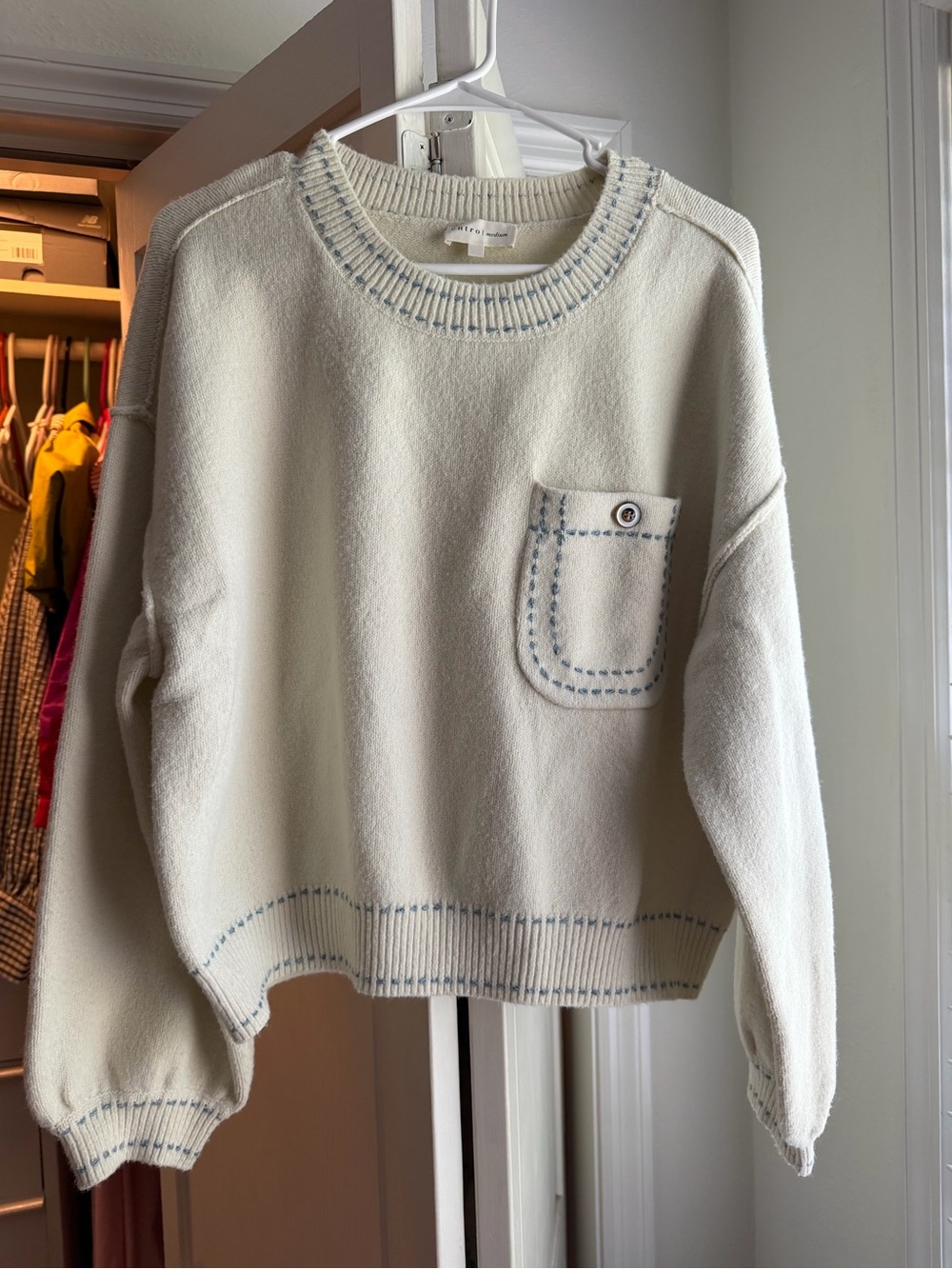 entro Cream Crewneck Sweater with Light Blue Stitching and Pocket